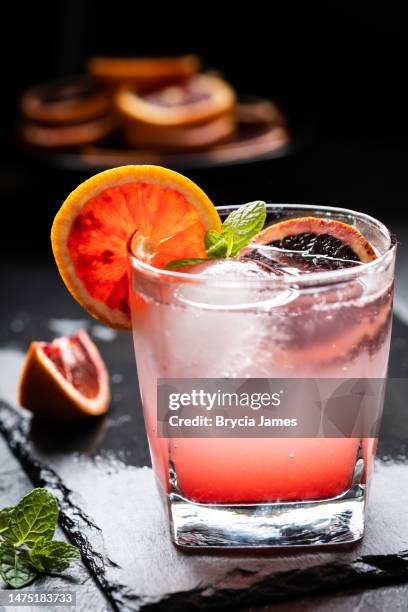 blood orange mocktail - mocktail stock pictures, royalty-free photos & images