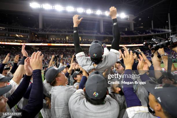 Team Japan celebrates after defeating Team USA in the World Baseball Classic Championship at loanDepot park on March 21, 2023 in Miami, Florida.