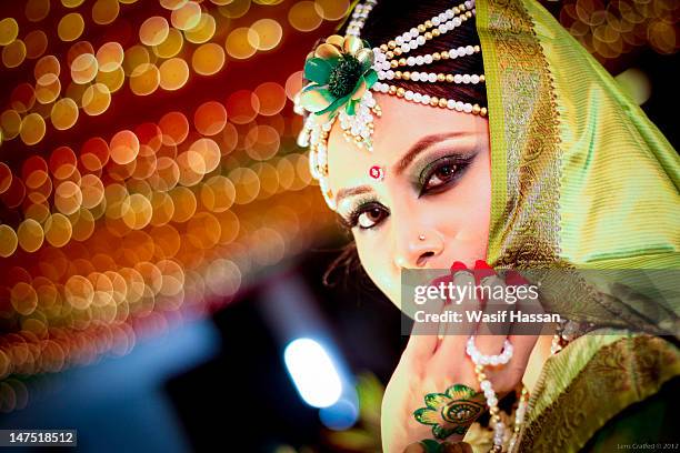 bride - indian bridal makeup stock pictures, royalty-free photos & images