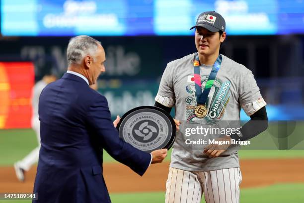 Shohei Ohtani of Team Japan is awarded the MVP award by Commissioner of Baseball Rob Manfred after defeating Team USA in the World Baseball Classic...
