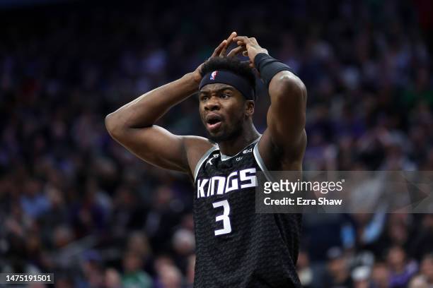 Terence Davis of the Sacramento Kings reacts to a call against the Boston Celtics in the second half at Golden 1 Center on March 21, 2023 in...