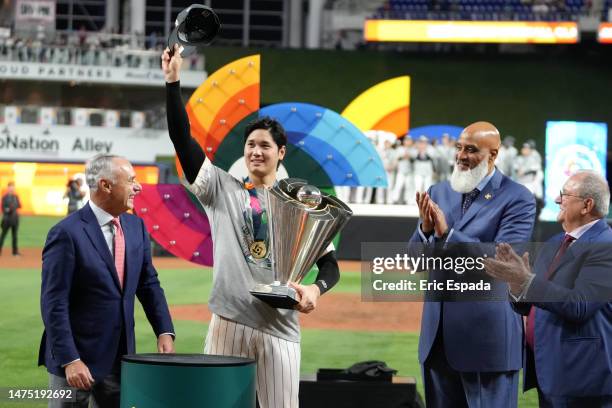 Shohei Ohtani of Team Japan applauds fans after awarded the MVP award by Commissioner of Baseball Rob Manfred after defeating Team USA in the World...