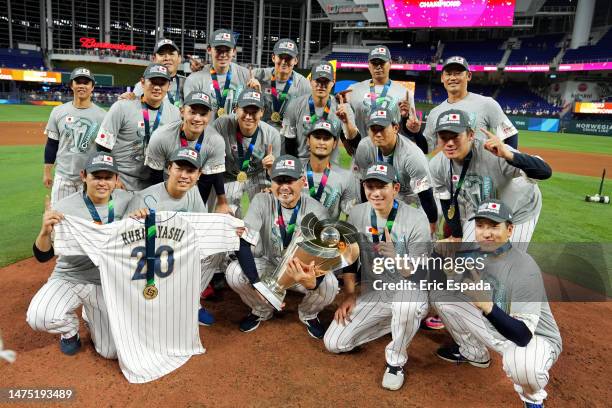 Team Japan poses for a photo after defeating Team USA 3-2 during the World Baseball Classic Championship at loanDepot park on March 21, 2023 in...