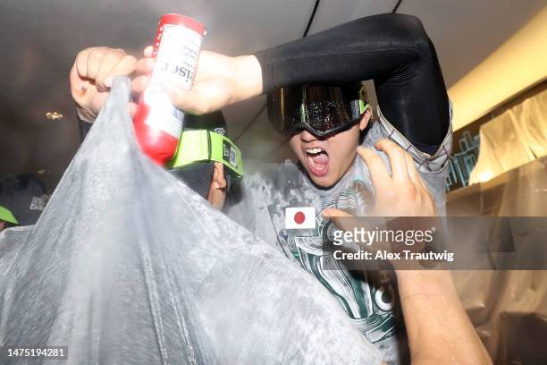 Shohei Ohtani of Team Japan celebrates in the clubhouse after defeating Team USA in the World Baseball Classic Championship 3-2 at loanDepot park on...