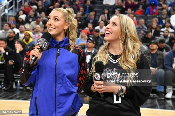 Hannah Cormier and Brittany Force speak to the crowd during a basketball game between the Los Angeles Clippers and the Oklahoma City Thunder at...