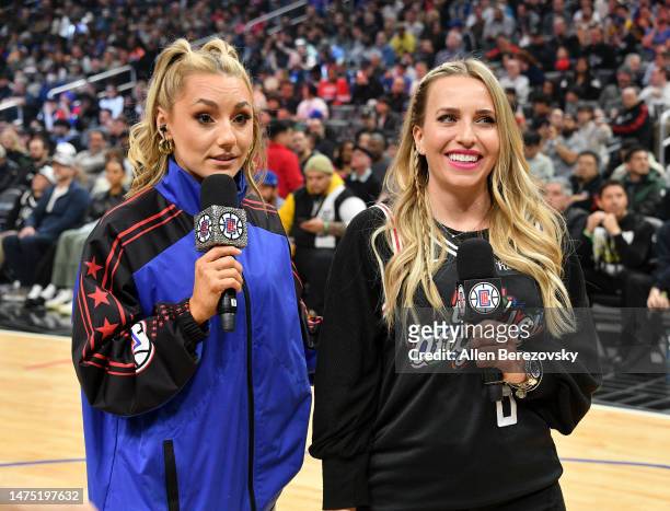 Hannah Cormier and Brittany Force speak to the crowd during a basketball game between the Los Angeles Clippers and the Oklahoma City Thunder at...