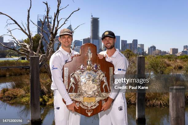 Peter Handscomb of Victoria and Sam Whiteman of Western Australia pose with the Sheffield Shield during the Sheffield Shield Final media opportunity...