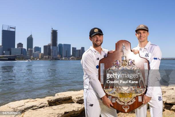 Sam Whiteman of Western Australia and Peter Handscomb of Victoria pose with the Sheffield Shield during the Sheffield Shield Final media opportunity...