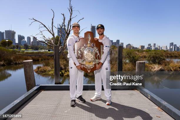 Peter Handscomb of Victoria and Sam Whiteman of Western Australia pose with the Sheffield Shield during the Sheffield Shield Final media opportunity...