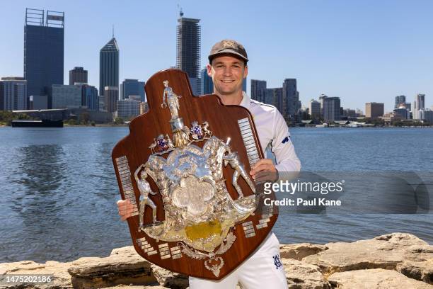 Peter Handscomb of Victoria poses with the Sheffield Shield during the Sheffield Shield Final media opportunity at Millers' Pool on March 22, 2023 in...