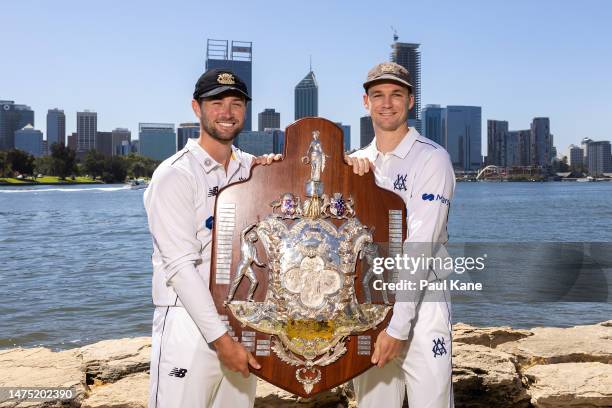 Sam Whiteman of Western Australia and Peter Handscomb of Victoria pose with the Sheffield Shield during the Sheffield Shield Final media opportunity...