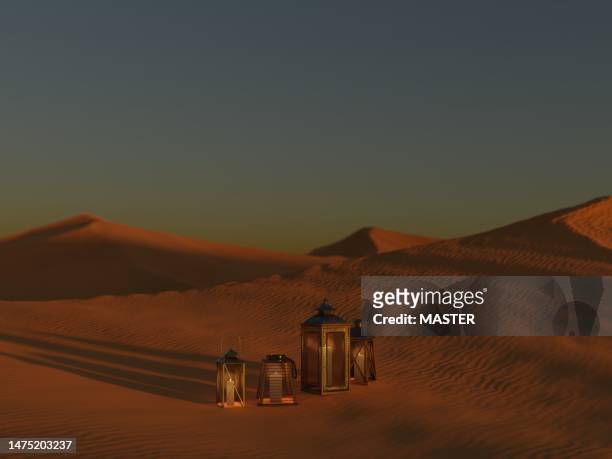 ramadan lanterns in desert at sunset - muslims celebrate the holy month of ramadan stock pictures, royalty-free photos & images