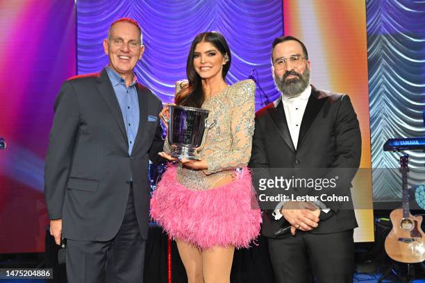Mike O’Neill, President and Chief Executive Officer of BMI, Honoree Ana Bárbara, 2023 BMI Icon Award Recipient, and Jesus Gonzalez, Vice President,...