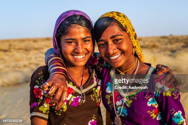 two happy gypsy indian girls, desert village, india - local gypsy stock pictures, royalty-free photos & images