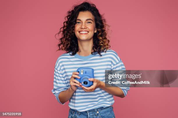 happy beautiful woman with analog camera - leisure work coffee happy stockfoto's en -beelden