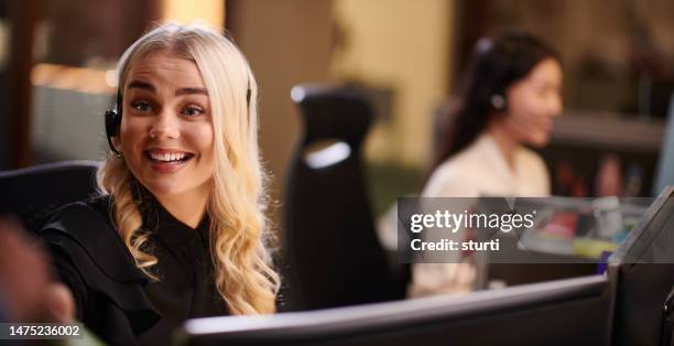 young office receptionist - happy smile with phone stock pictures, royalty-free photos & images