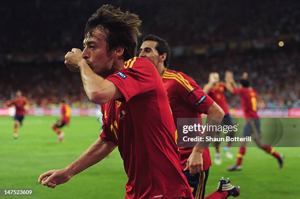 David Silva of Spain celebrates after scoring the opening goal during the UEFA EURO 2012 final match between Spain and Italy at the Olympic Stadium...