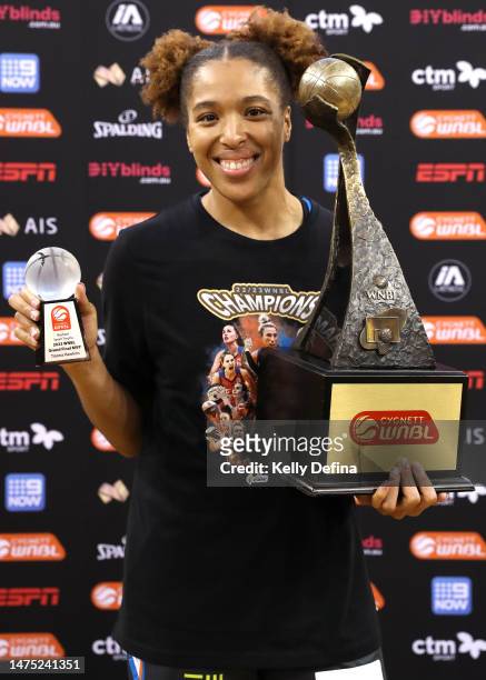 Tianna Hawkins of the Fire poses with the trophy after winning the WNBL Championship during game two of the WNBL Grand Final series between Southside...