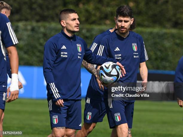 Marco Verratti and Jorginho of Italy looks on during an Italy training session at Centro Tecnico Federale di Coverciano on March 22, 2023 in...