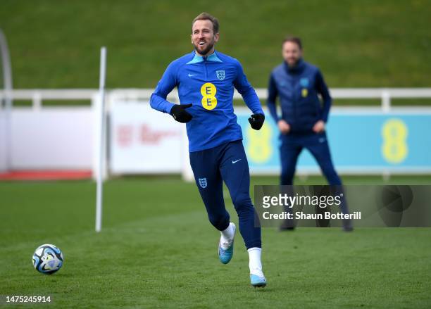 Harry Kane of England reacts during a training session at St Georges Park on March 22, 2023 in Burton-upon-Trent, England.