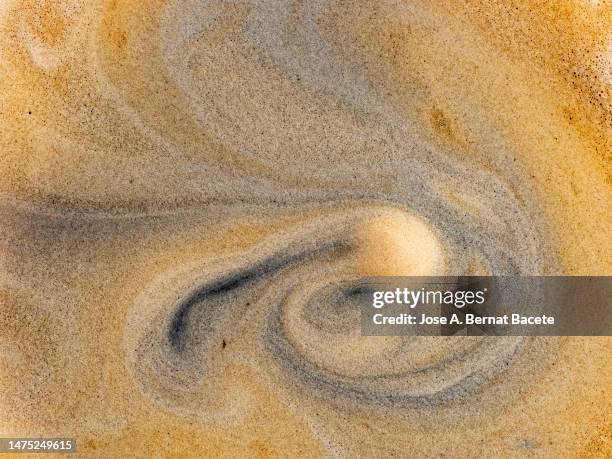 full frame of foam and textures of a freshly brewed espresso cup. - coffee with chocolate stock-fotos und bilder