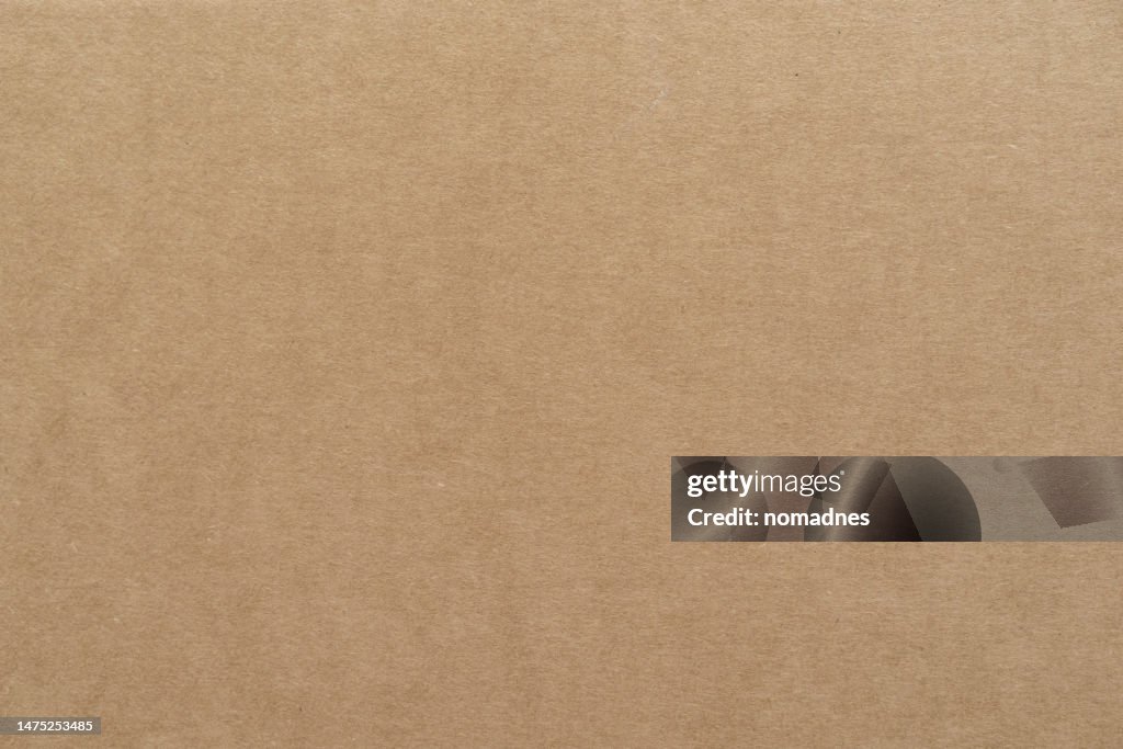 Cardboard paper texture. Packaging box natural color texture.
