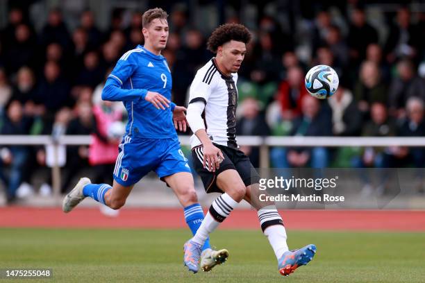 Nnamdi Collins of Germany U19 is challenged by Pio Esposito of Italy U19 during the UEFA European Under-19 Championship Malta 2023 qualifying match...