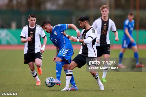 Muhammed Damar of Germany U19 challenges Luca D'Andrea of Italy U19 during the UEFA European Under-19 Championship Malta 2023 qualifying match...