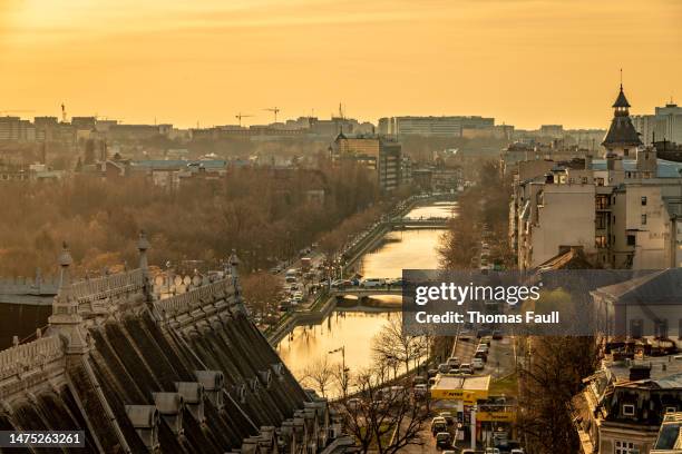 sunset over bucharest with dâmbovița river - romania stock pictures, royalty-free photos & images