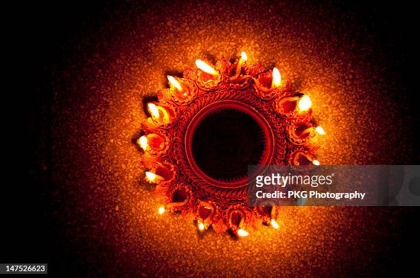 belated happy deepawali - laxmi puja during tihar or deepawali and diwali celebrations fotografías e imágenes de stock