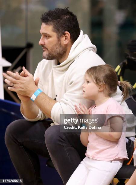 Brendan Fevola watches the game during games two of the WNBL Grand Final series between Southside Flyers and Townsville Fire at State Basketball...