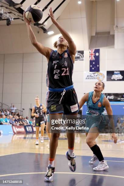 Tianna Hawkins of the Fire drives to the basket during games two of the WNBL Grand Final series between Southside Flyers and Townsville Fire at State...