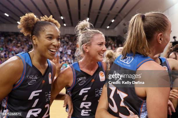 Tianna Hawkins of the Fire and Lauren Nicholson of the Fire celebrate winning the WNBL Championship during games two of the WNBL Grand Final series...