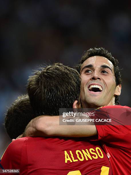 Spanish players celebrate after a second goal during the Euro 2012 football championships final match Spain vs Italy on July 1, 2012 at the Olympic...