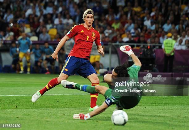 Fernando Torres of Spain scores his side's third goal past Gianluigi Buffon of Italy during the UEFA EURO 2012 final match between Spain and Italy at...
