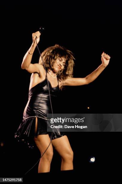 Tina Turner performing on stage at the Maracana Stadium during her tour in Brazil in 1988.