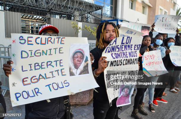 Tunis - Tunisia, 21 March 2023: Migrants holding signs during the Protest in front of UNHCR Headquarter in the capital Tunis Tunisia, demanding help...