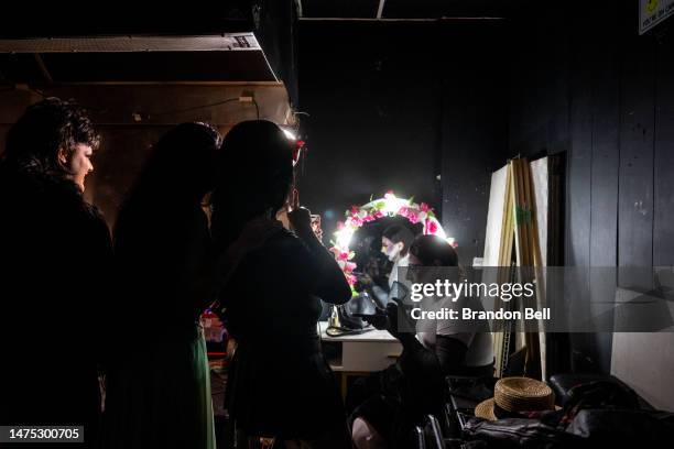 Drag Queen Louisiana Purchase and her fellow performers gather together before performs at the Swan Dive nightclub on March 20, 2023 in Austin,...