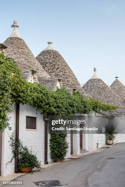 the trulli houses of alberobello - alberobello stock-fotos und bilder