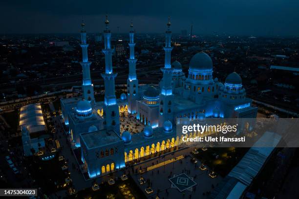 An aerial view of the Sheikh Zayed Solo Grand Mosque as muslims attend Tarawih prayers to mark the start of the holy month of Ramadan on March 22,...