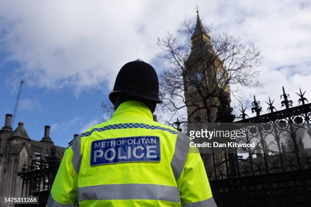 Metropolitan Police officers outside the Houses of Parliament on March 21, 2023 in London, England. A report published today of behavioural standards...