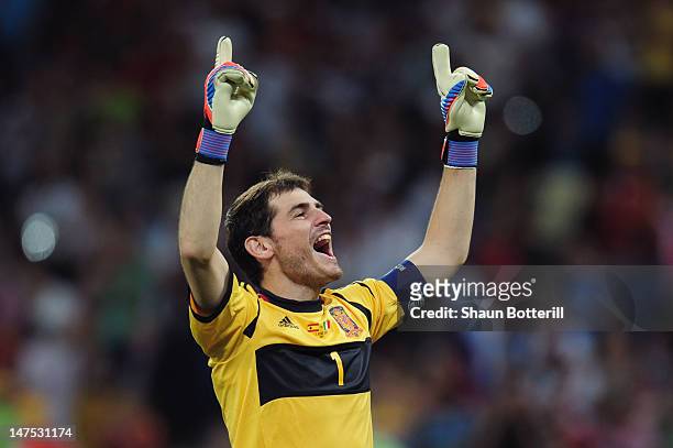 Iker Casillas of Spain celebrates after his team-mate Fernando Torres scored their third goal during the UEFA EURO 2012 final match between Spain and...