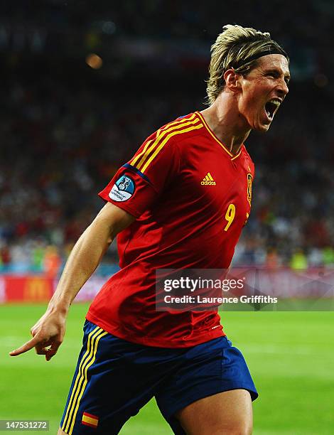 Fernando Torres of Spain celebrates scoring his team's third goal during the UEFA EURO 2012 final match between Spain and Italy at the Olympic...