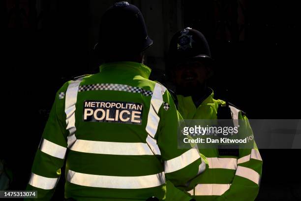 Metropolitan Police officers outside the Houses of Parliament on March 21, 2023 in London, England. A report published today of behavioural standards...