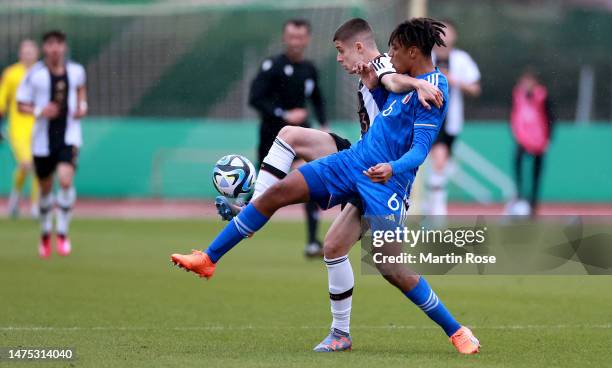 Nicolo Tresoldi of Germany U19 challenges Filippo Mane of Italy U19 during the UEFA European Under-19 Championship Malta 2023 qualifying match...