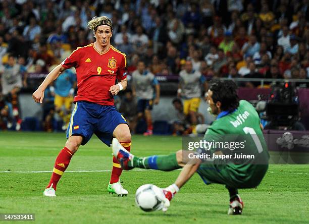 Fernando Torres of Spain scores his team's third goal past Gianluigi Buffon of Italy during the UEFA EURO 2012 final match between Spain and Italy at...