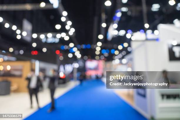 abstract blur background in exhibition hall event - tradeshow 個照片及圖片檔