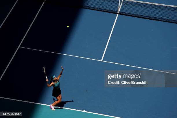 Emma Raducanu of Great Britain serves against Bianca Andreescu of Canada in their first round match during the Miami Open at Hard Rock Stadium on...