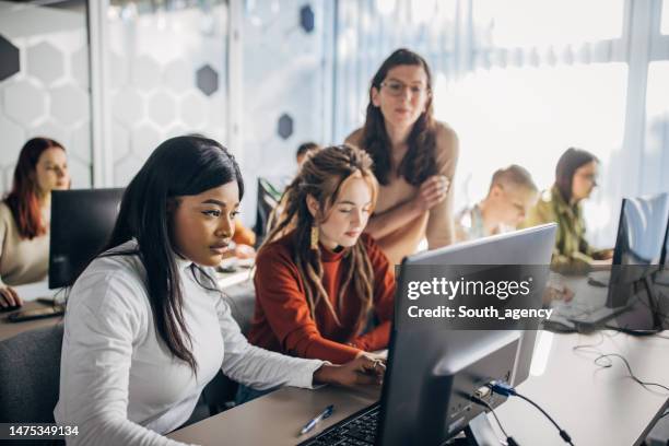 programming school class - computer lab students stock pictures, royalty-free photos & images