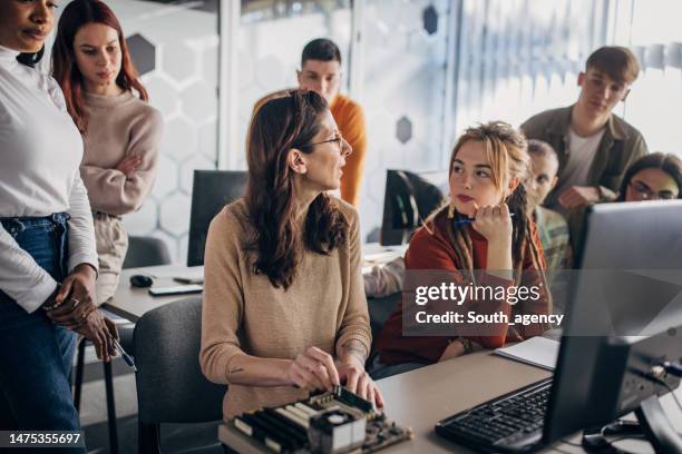 students at computer school - older computer programmer stock pictures, royalty-free photos & images